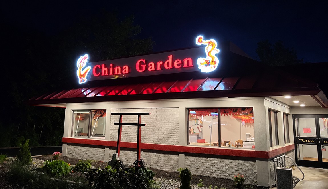 China Garden storefront illuminated at night